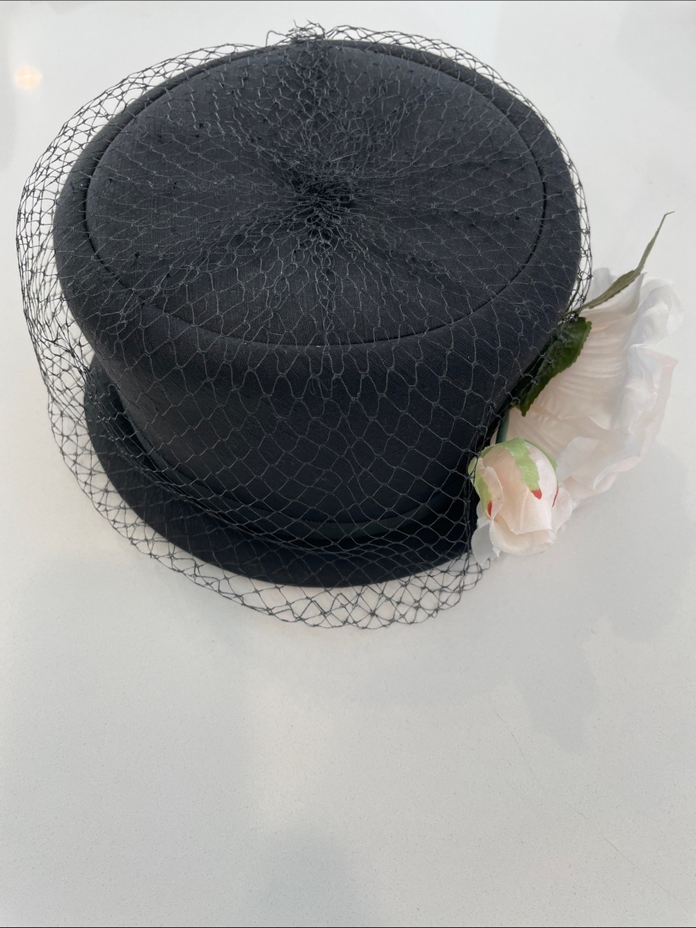 Black Veiled Pillbox Hat with White Floral Accent